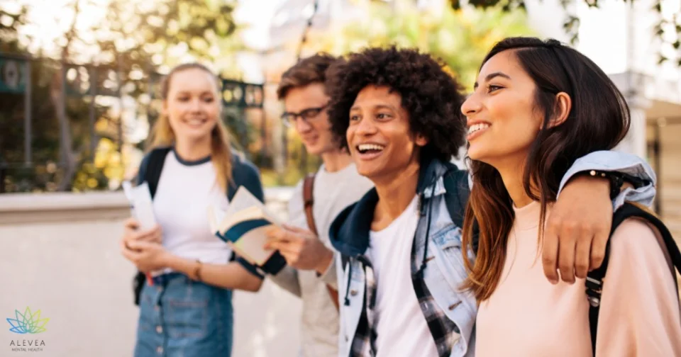 College students connecting with friends on campus
